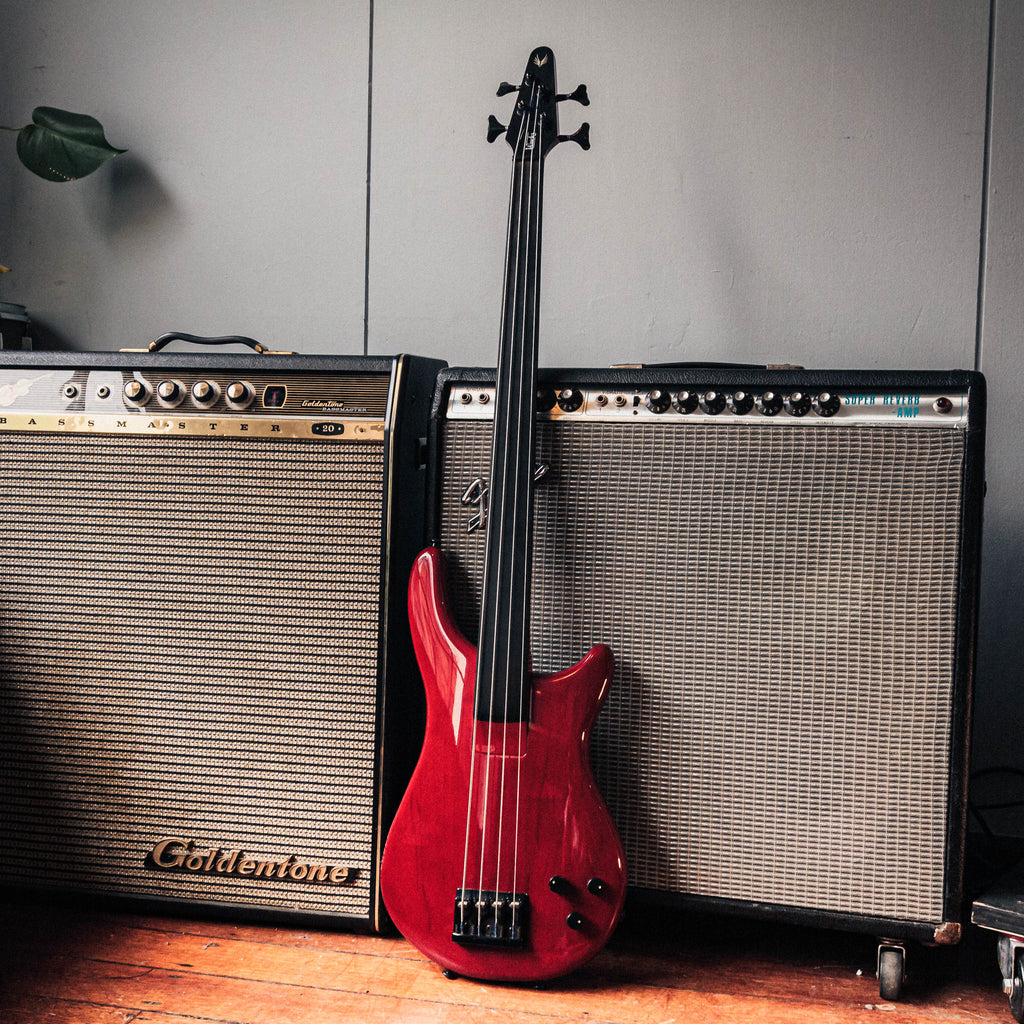 Tokai Works Bass Revolution TW-1500 Fretless Bass Transparent Red 1987